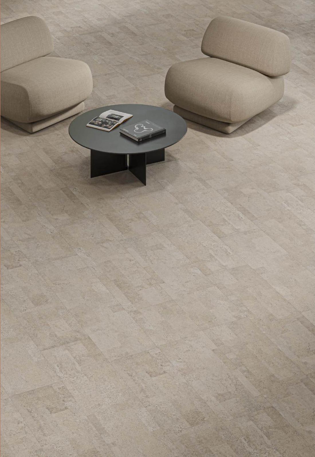 Two soft armchairs on a pale Recolour cork floor